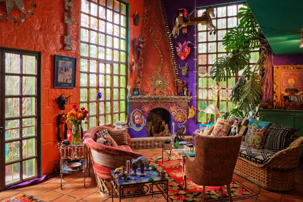 An artist living room with lots of colorful items.